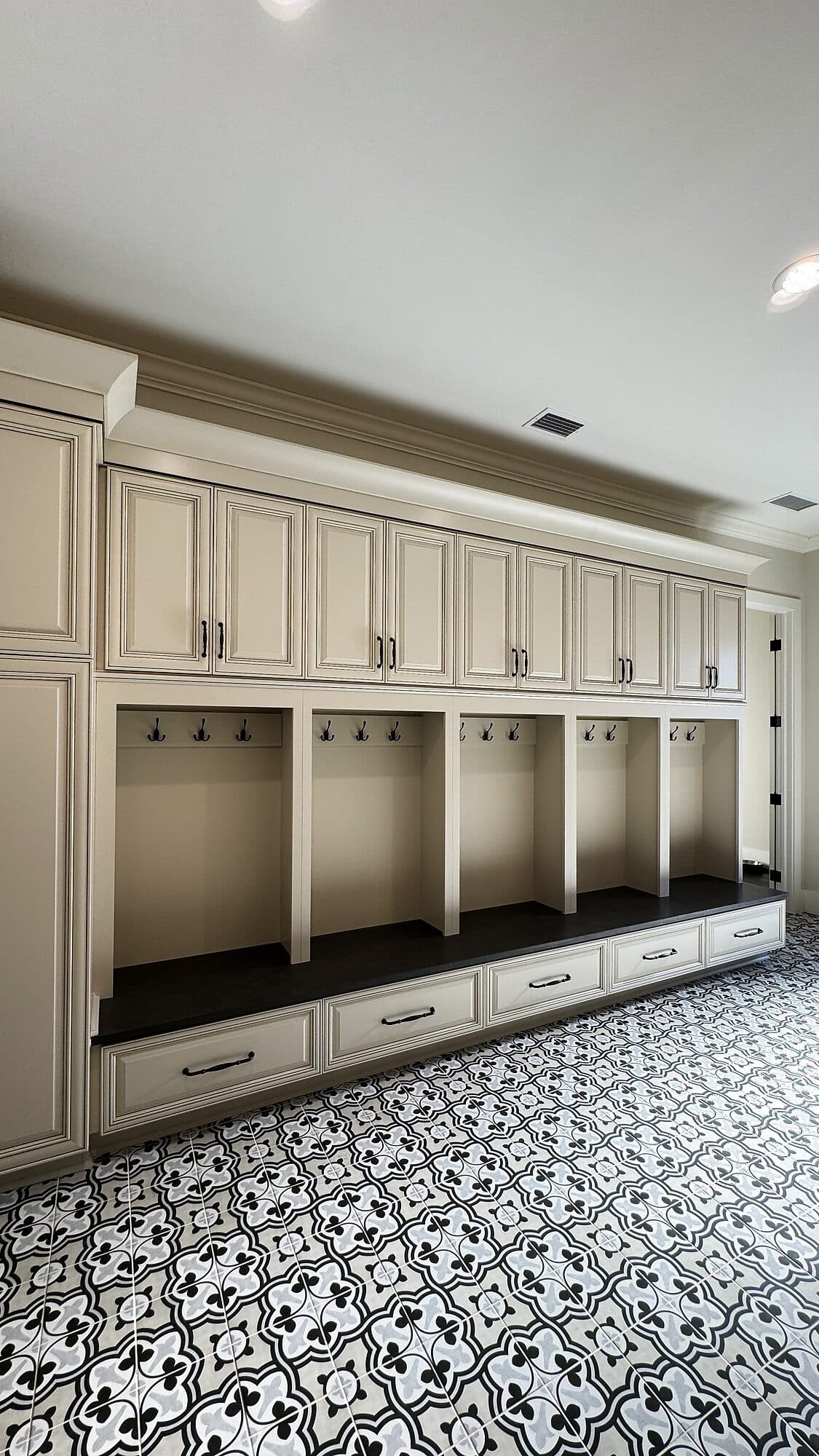 Custom built-in cabinetry with open shelving in a custom home in Nocatee, Florida